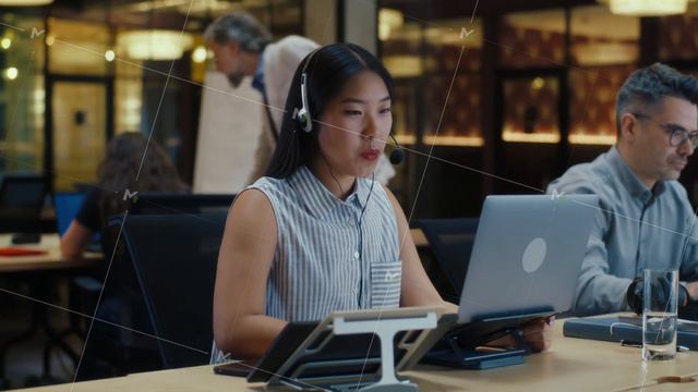 Asian female call center operator in headset смотреть онлайн