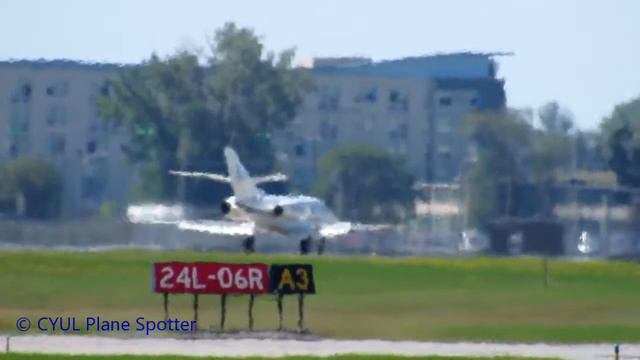 Club Jet Falcon 10 (FA10) landing & close up taxiing in Montreal (YUL) смотреть онлайн