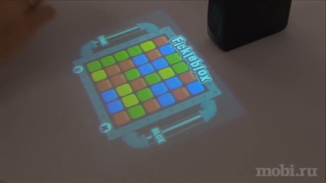 Mobi на CES 2010: проектор Light Touch смотреть онлайн