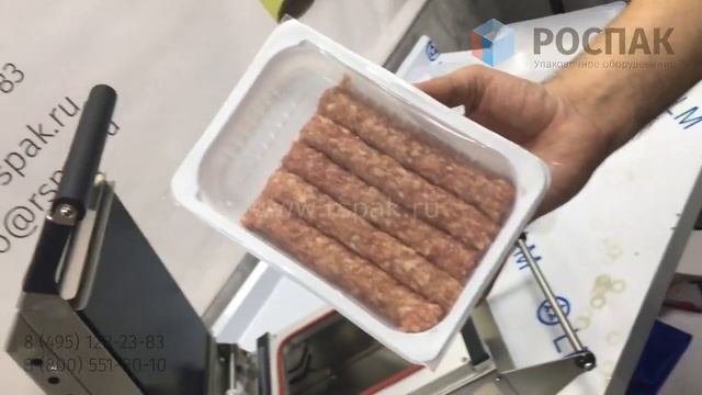 HTS-225 упаковка колбасок на ручном запайщике лотков от РОСПАК 8-495-128-23-83
