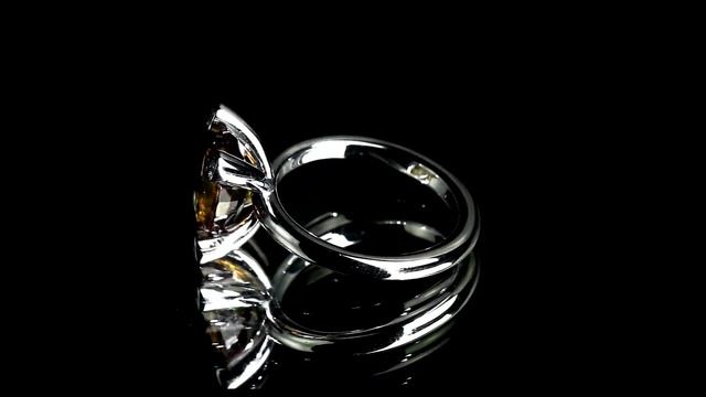 Кольцо из белого золота с коричневым сапфиром 4,01 карат и бриллиантами 0,35 карат (сертификат GIA) смотреть онлайн