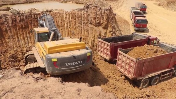 Volvo EC480Dl Excavator Loading Trucks- Excavator digging land