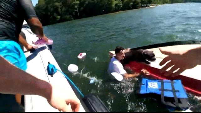 DNR rescues 8 people, dog after boat capsized | Body camera video смотреть онлайн