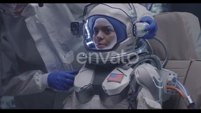 Space suits for sale. Astronaut getting ready for flight by AnyRobots смотреть онлайн