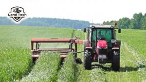 Трактор Massey Ferguson 6713 с автопилотом Trimble косит траву роторной косилкой Kverneland Taarup