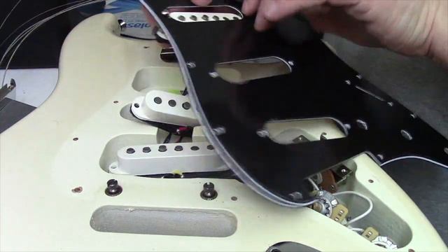 How To Install A Pickguard On A Fender Stratocaster. Gear Alert !!