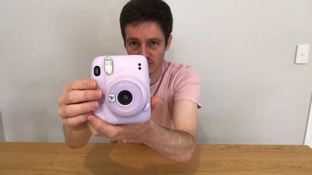 2 Easy Steps To Switch On/Off The Instax Mini 11 (And How to Activate Selfie Mode)