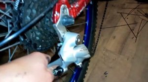 Как заменить задний переключатель на велосипеде (не снимая цепь) ?