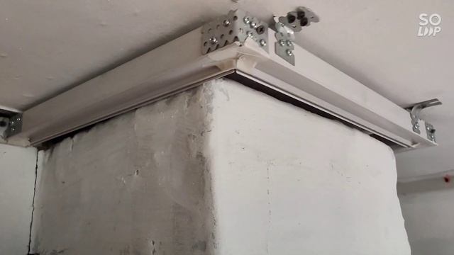 Натяжной потолок белый глянец. Обход печной трубы евробрусом. смотреть онлайн