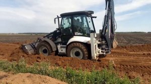 Планировка дороги Экскаватором-Погрузчиком Hidromek 102