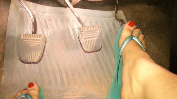 Practice Driving in aqua flip flops