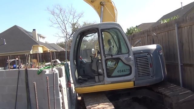 First Day of Rock Work Setting the Large Boulders for the Grotto Waterfalls in Texas смотреть онлайн