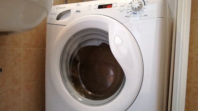 Lavatrice Candy Grandó comfort: Cotone 40°C, centrifuga finale a 1000 giri смотреть онлайн