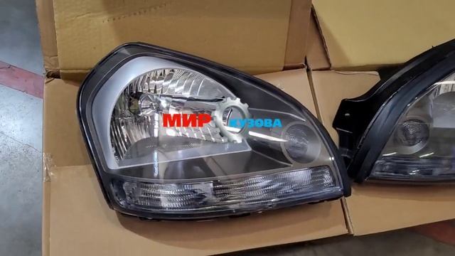Hyundai Tucson 1 Фары передние серые внутри оптика Хундай Туксон МирКузова смотреть онлайн