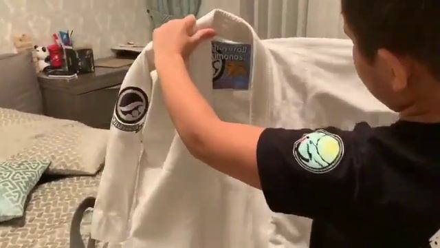 Как надо правельно завязывать пояс, и складывать кимоно смотреть онлайн