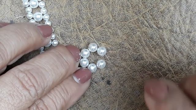 Элегантное жемчужное ожерелье.