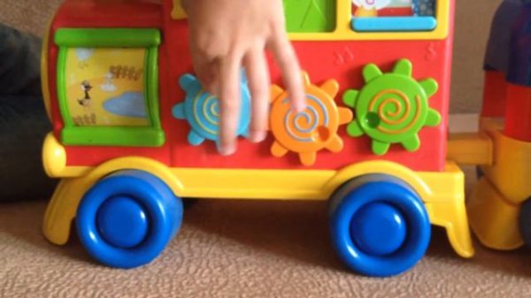 Игрушка большой паровоз каталка Winfun