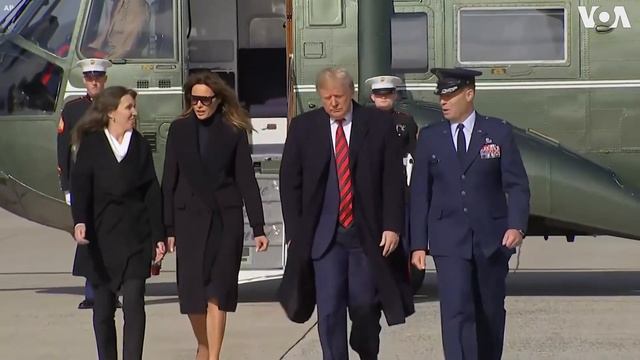 Мелания Трамп в черном пальто смотреть онлайн