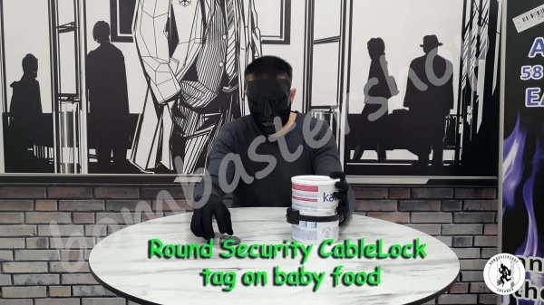 Round Security CableLock tag on baby food