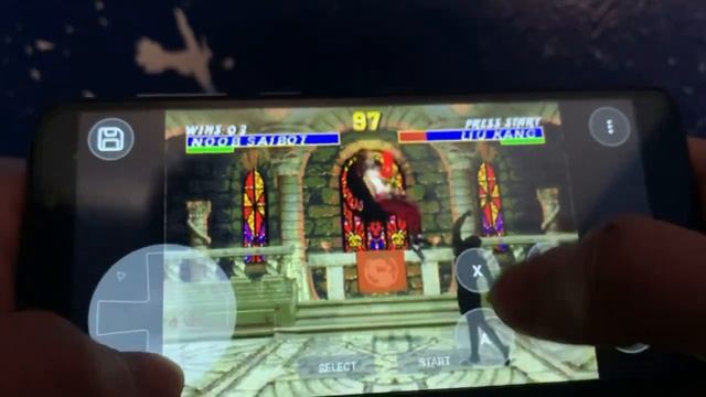 Playing Ultimate Mortal Kombat 3 on mobile смотреть онлайн