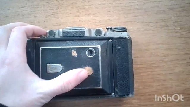 Распаковка лота "Фотоапарат Момент 1 СССР 40е Объектив Индустар 23 Москва" с виолити смотреть онлайн