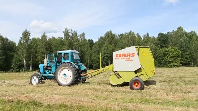 Пресс-подборщик Claas Rollant 42 Farmer  с трактором т 40.