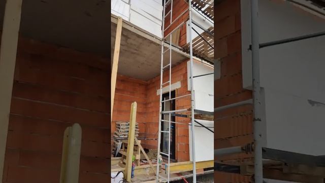 Утепление фасадов двухэтажного дома пенопластом, облицовка фасадов камнем. СФТК Мокрый Фасад Baumit