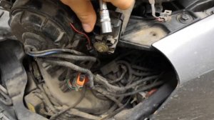 Снятие электрокорректора фары Kia magentis