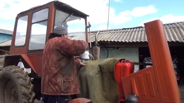 Как заводим трактор в мороз. смотреть онлайн