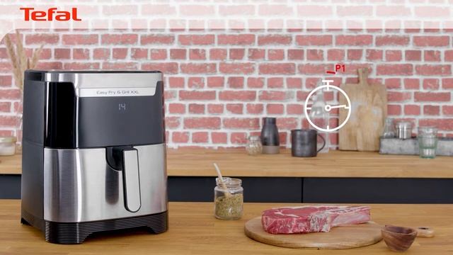 Гответе две храни едновременно в Tefal Easy Fry & Grill EY801D смотреть онлайн