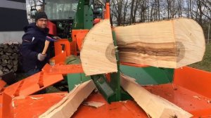 Современные станки для заготовки дров в действии