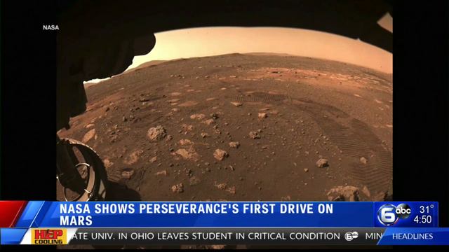 NASA's new Mars rover hits dusty red road, 1st trip 21 feet смотреть онлайн