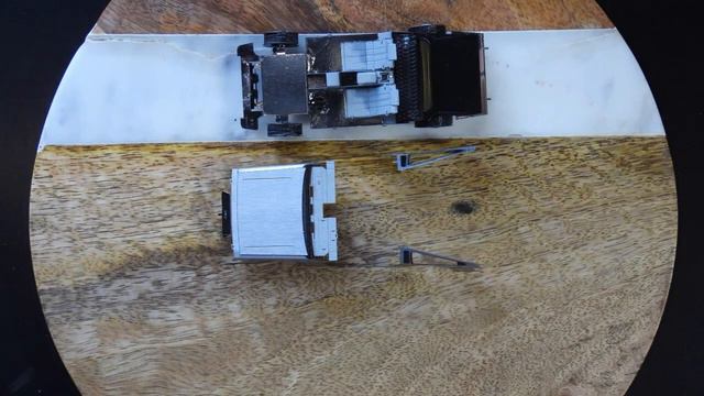 Assembling a Metal Earth DeLorean model kit in Stop Motion смотреть онлайн