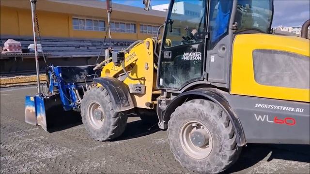 Строительство футбольного стадиона с покрытием из искусственной травы и беговыми дорожками смотреть онлайн