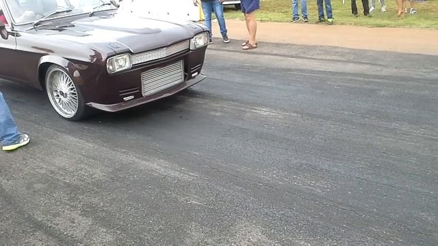Ford Capri 2jz 12,2s @191kmh in the rain with clutch slipping and soft lunch смотреть онлайн