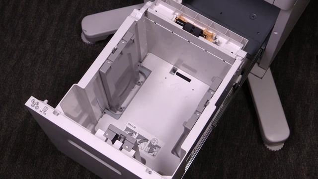 Xerox® VersaLink® C605 Color Multifunction Printer Loading Paper in the High Capacity Feeder смотреть онлайн