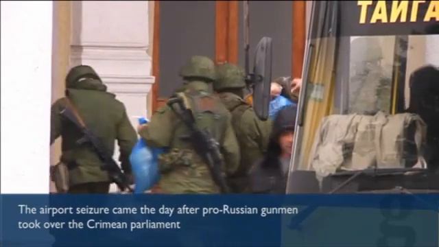 Ukraine: Armed Men Patrol Simferopol Airport In Crimea
