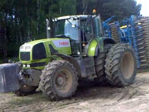 трактор Claas с сеялкой Rabe