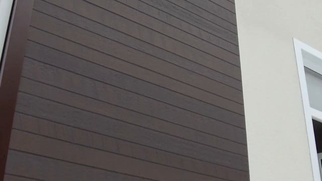 Фиброцементные панели Nichiha на фасаде дома из СИП-панелей