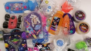 Большая распаковка. "Тайна пятой планеты" пятёрочка. Игрушки. Слаймы. ОБЗОРЫШ крутые ролики.