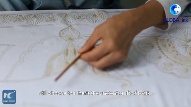 GLOBALink | Chinese fashion designer brings ethnic Miao fabric to int'l runways