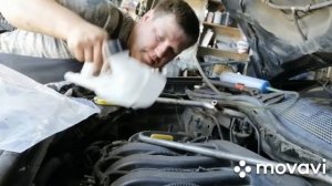 Как заменить расшерительный бачек на рено МЕГАН 2