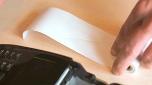 Замена чековой ленты на POS терминале PAX D210