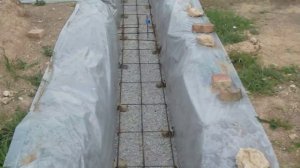 Подготовка каркаса к заливке фундаментной подушки.