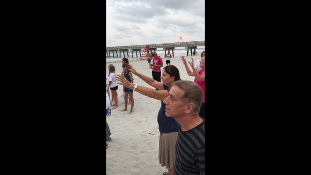 Praying and Singing Hurricane Irma Away on a Florida beach смотреть онлайн