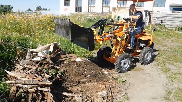 Погрузчик с челюстным ковшом смотреть онлайн