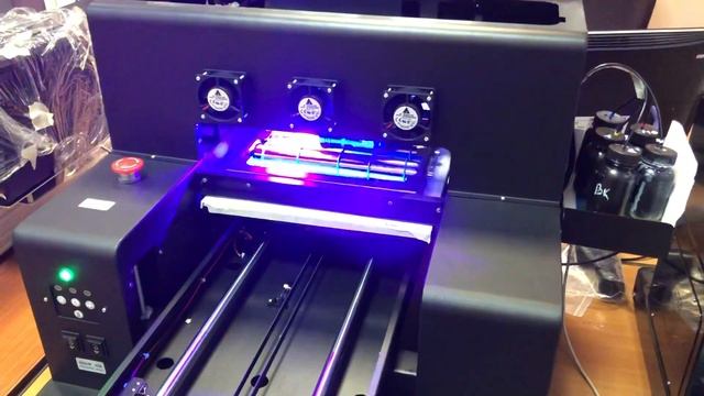 УФ принтер A3UV Rotax печать на черной пластиковой бутылке смотреть онлайн