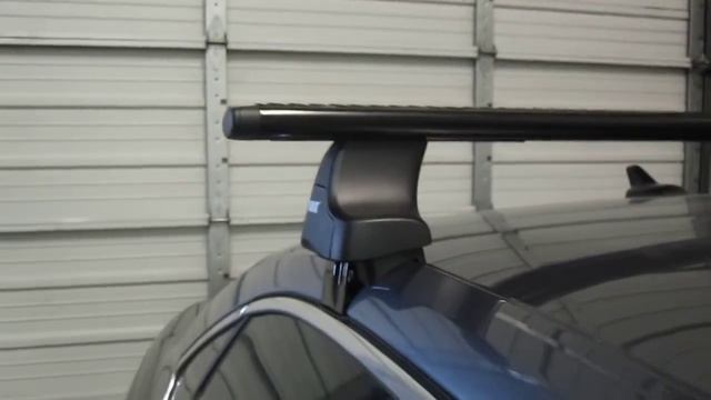 2012 Volkswagen Passat 4-Dr with Thule 480R Traverse AeroBlade Roof Rack by Rack Outfitters смотреть онлайн