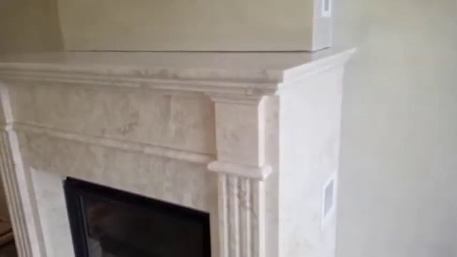 Камин из бежевого мрамора Delicate Cream; облицовка каминов и очагов мрамором в Киеве смотреть онлайн