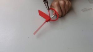 How to remove Off-White™ zip tie tag